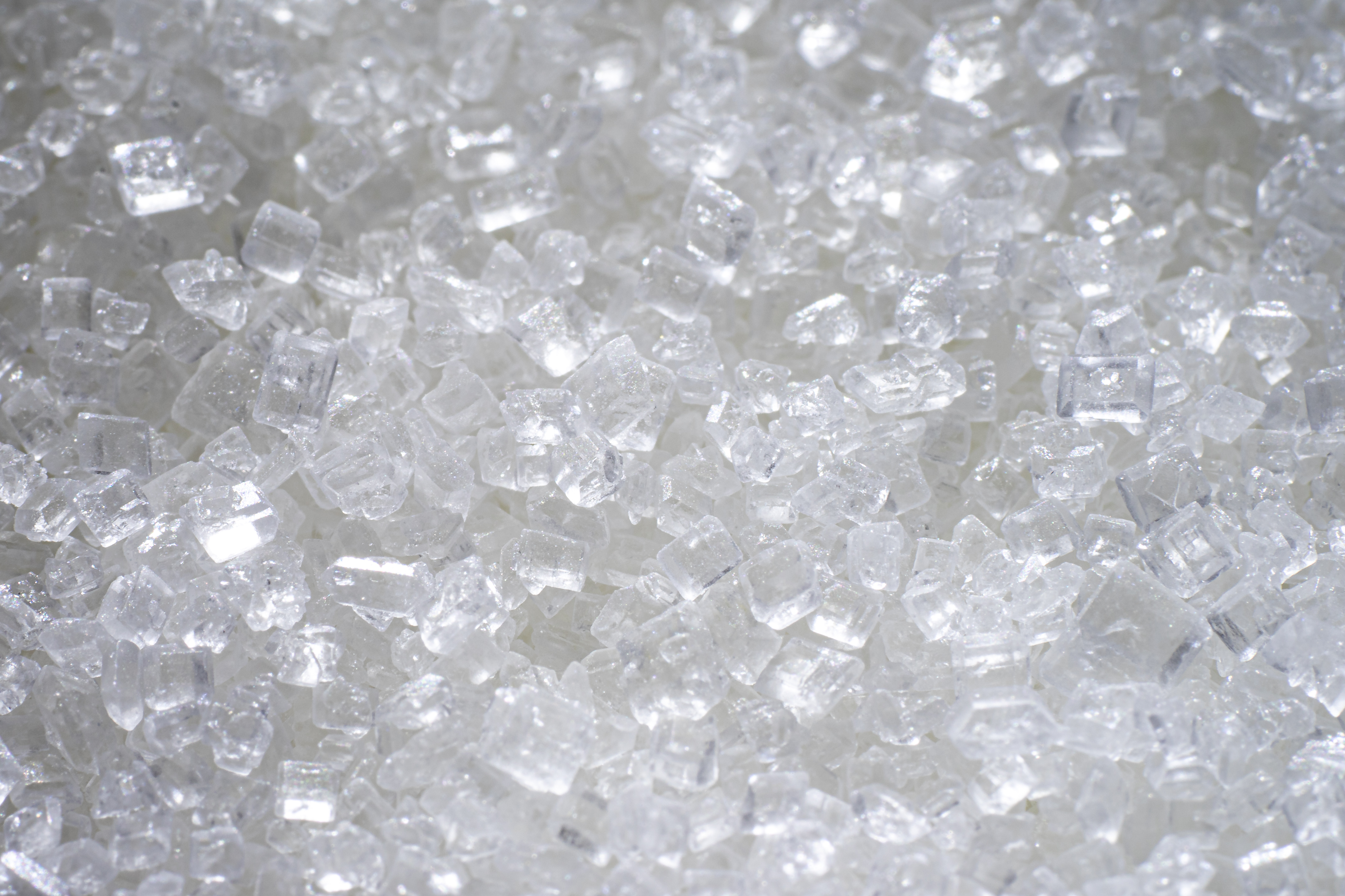 Granulated white sugar crystals for ICUMSA 45 visual context